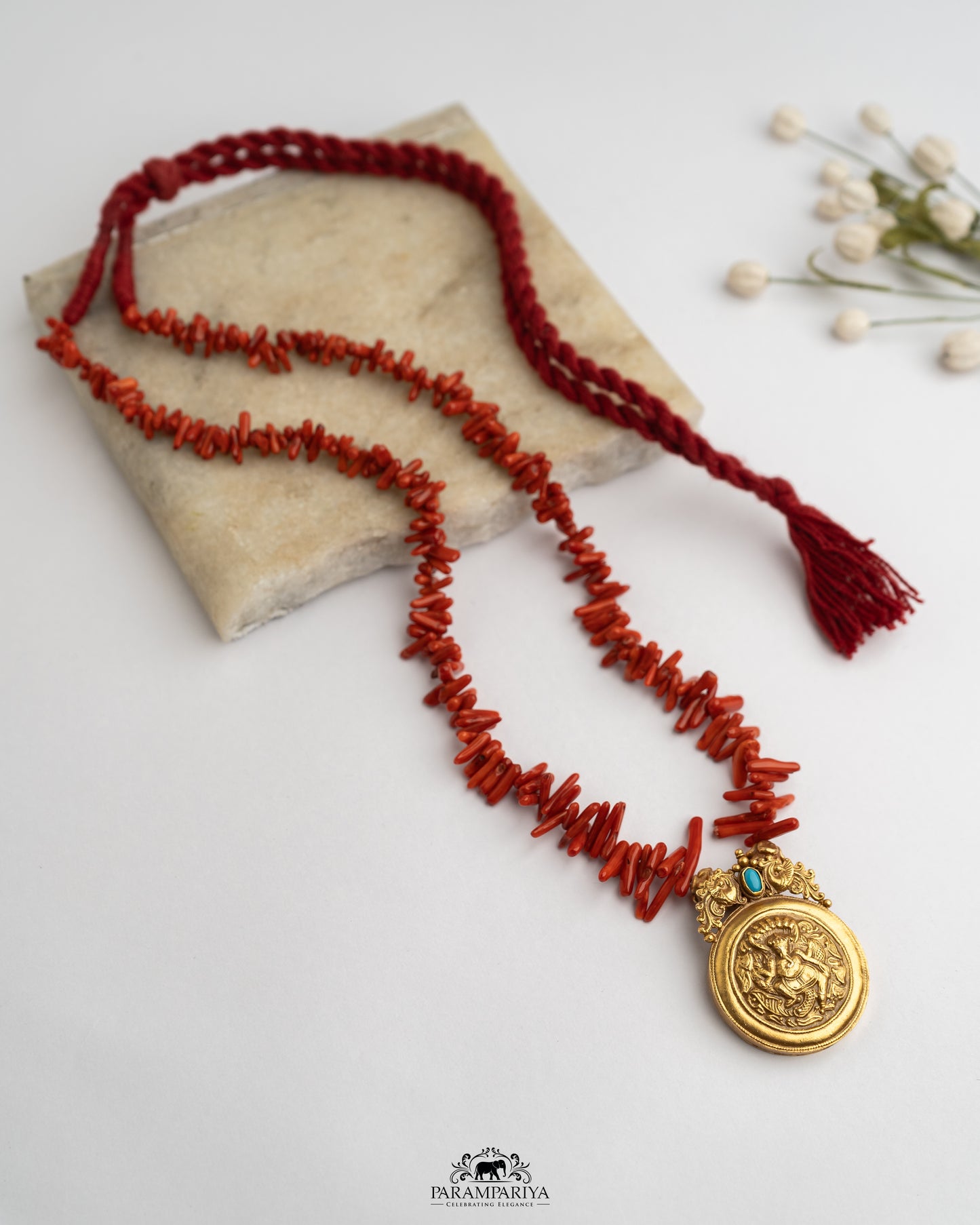 The Coral Charm!!
pure silver necklace with semi precious coral beads.