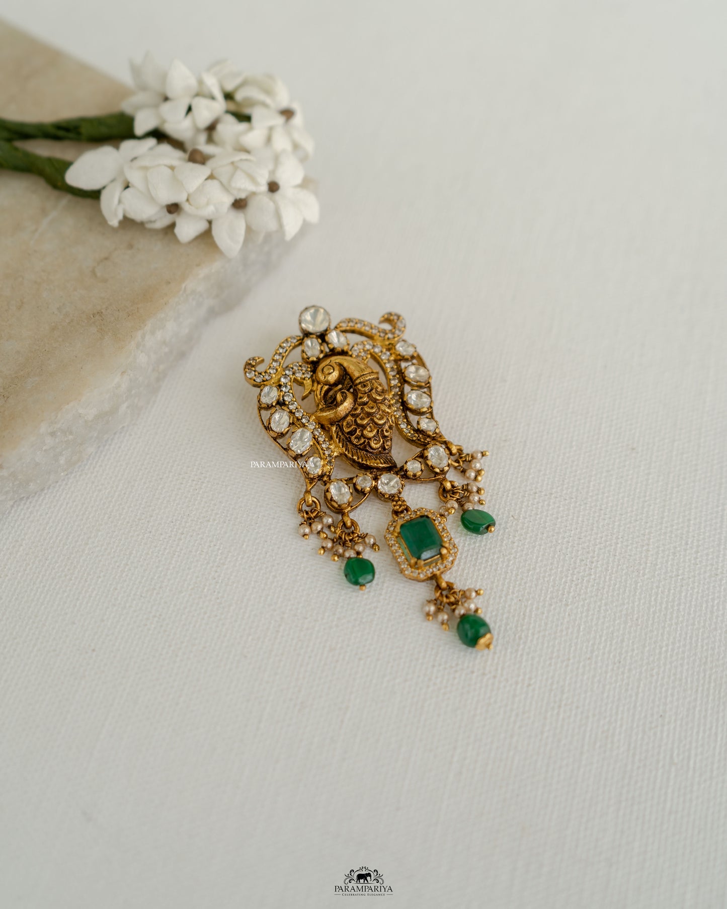 Peacock Elegance!!
Nakshi temple pendants crafted from 92.5 silver, gold micron plated and adroned with moissanite stones.