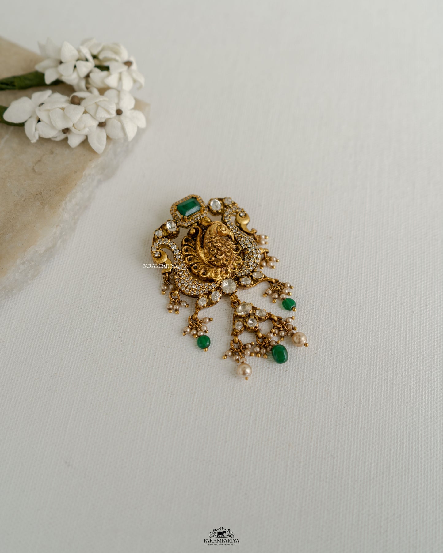 Peacock Elegance!!
Nakshi temple pendants crafted from 92.5 silver, gold micron plated and adroned with moissanite stones.