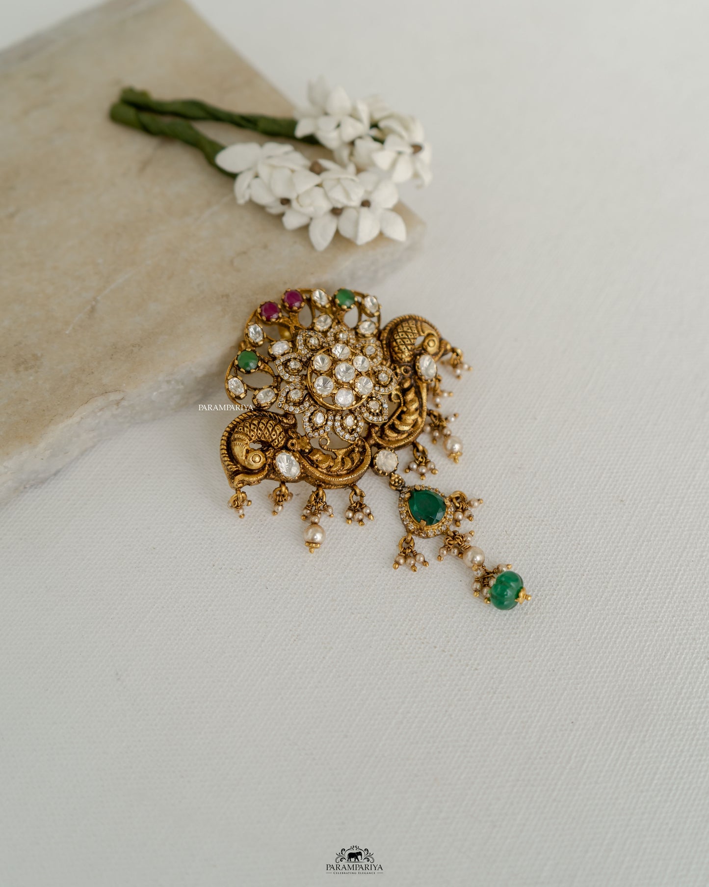 Peacock Elegance!!
Nakshi temple pendants crafted from 92.5 silver, gold micron plated and adroned with moissanite stones.