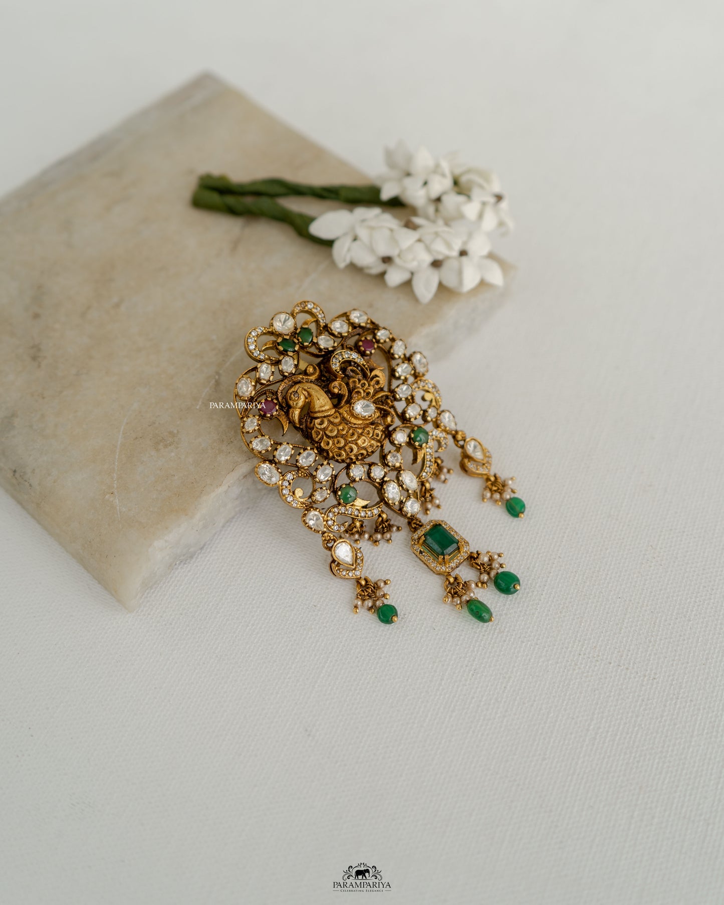 Peacock Elegance!!
Nakshi temple pendants crafted from 92.5 silver, gold micron plated and adroned with moissanite stones.