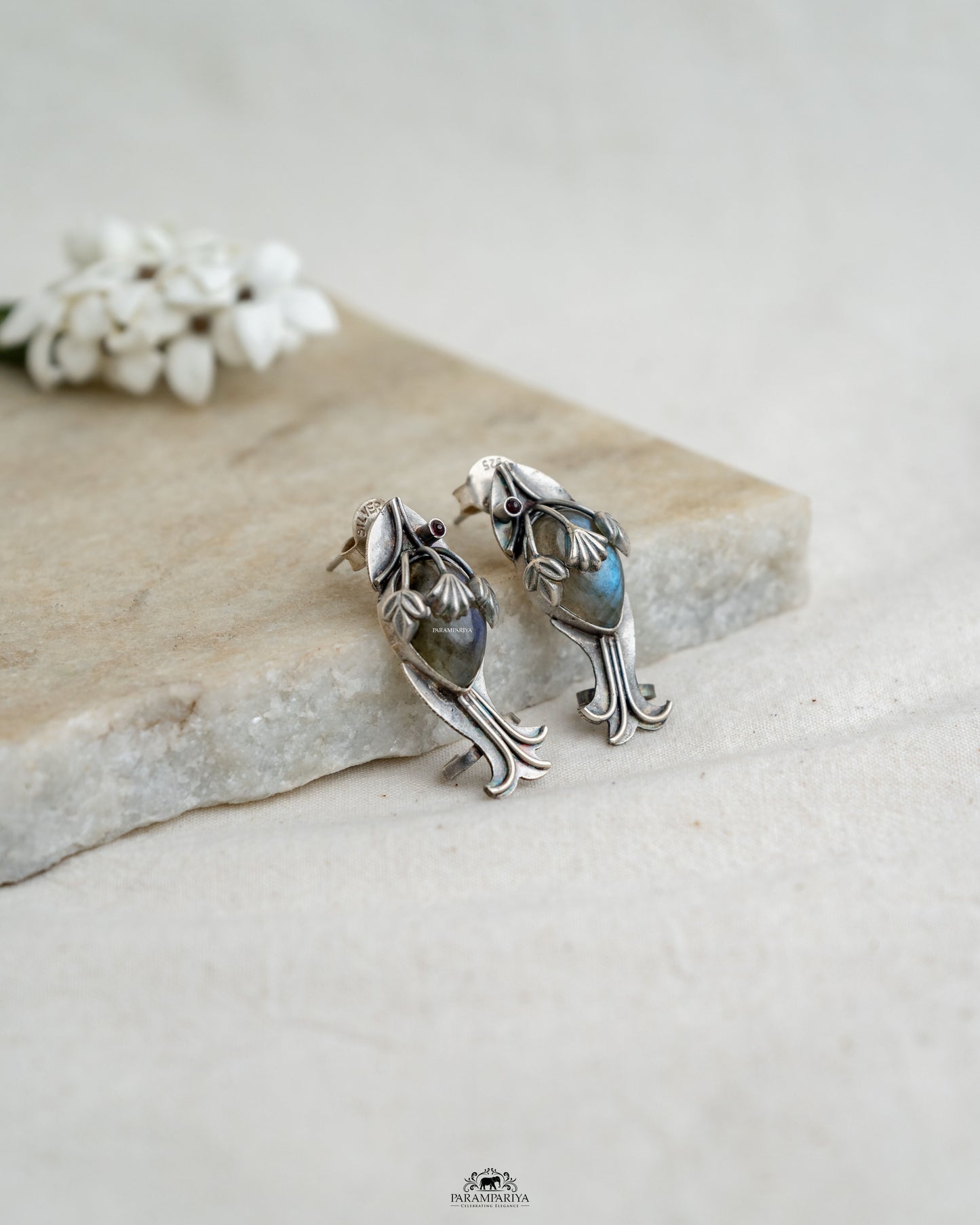 Adorable Mini Earcuffs!!
pure silver cuff style earrings with tanzanite and amethyst stones.