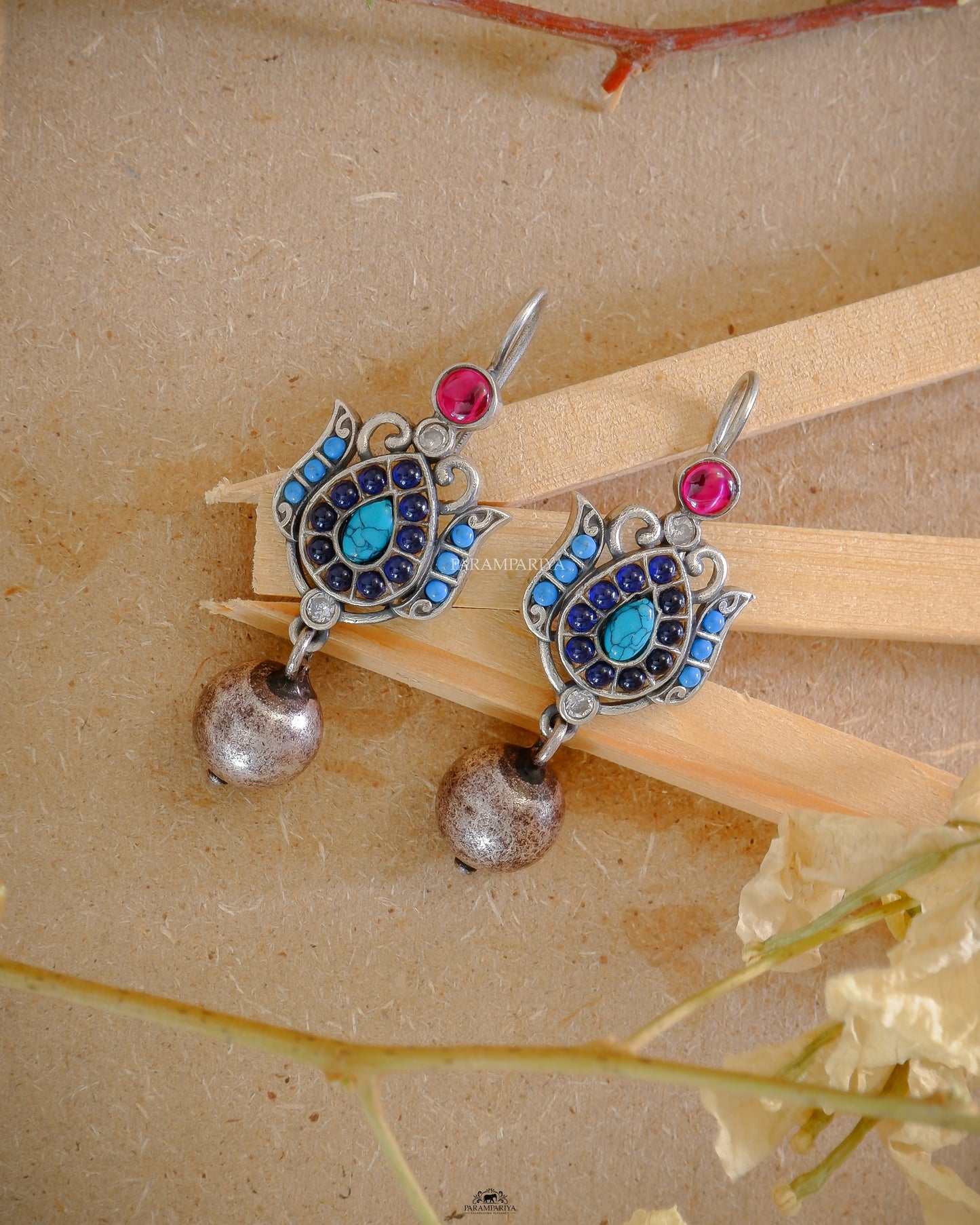 This hook earrings make a subtle, yet stunning statement. Crafted with pure silver hooks and handpicked kemp stones, these earrings will add a touch of sparkle to any outfit. Perfect for everyday wear or special occasions.