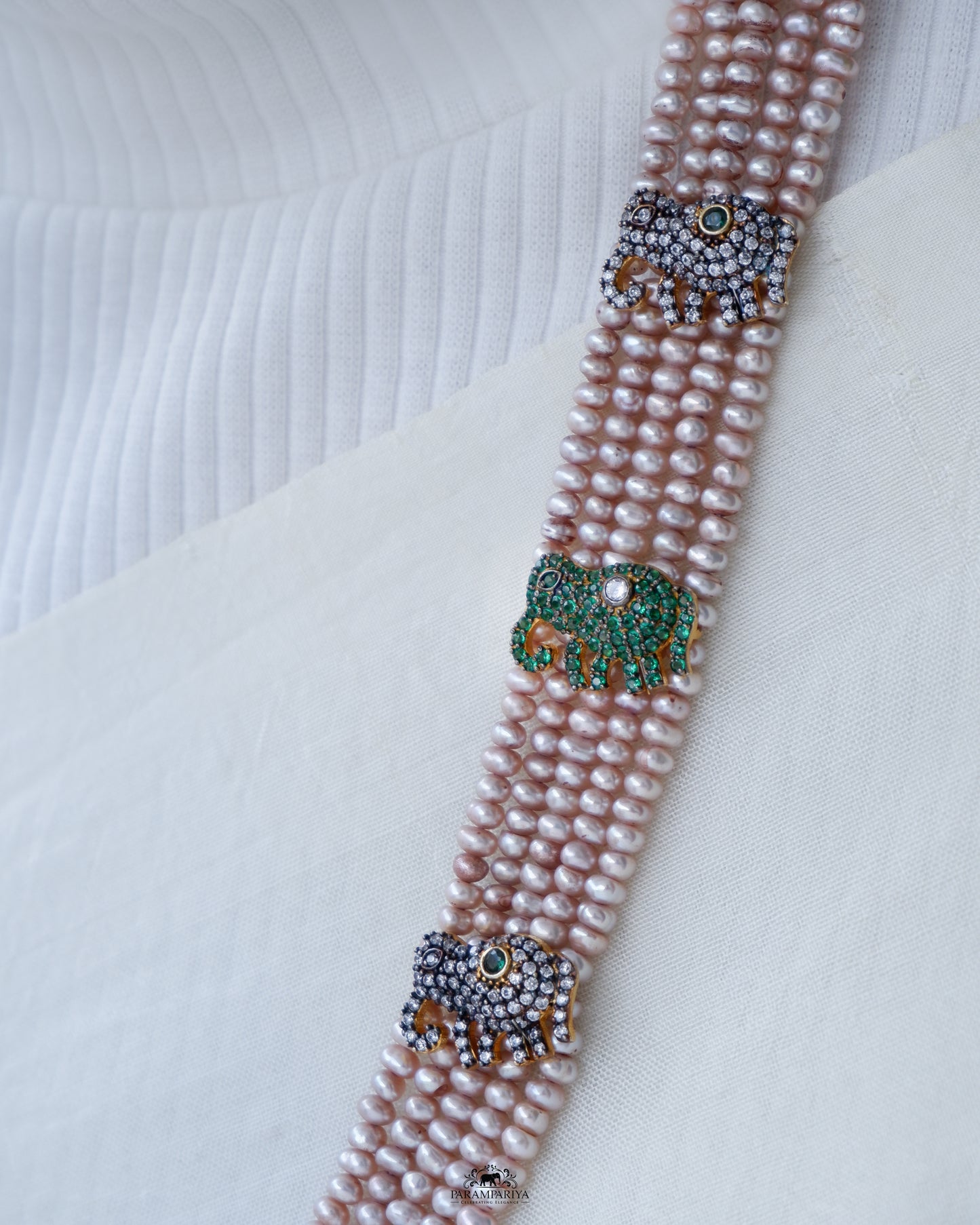 The Pearl Magic!! Parampariya’s very own elephant necklace in antique pearl with a touch of green zircon.