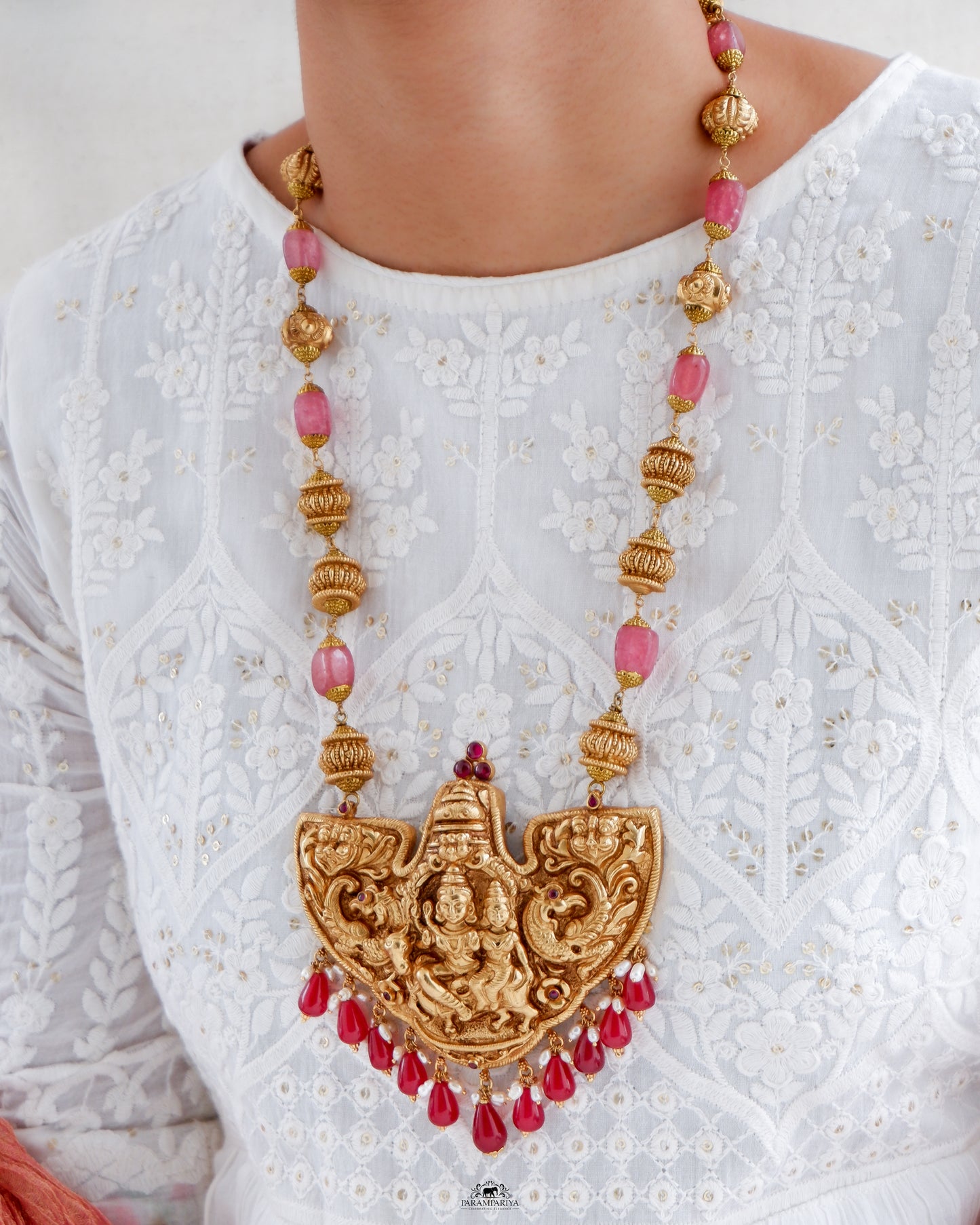 Intricately-crafted temple antique necklace featuring a depiction of Shiv and Paravathi on pure silver with antique gold micron plating, a perfect unisex necklace.