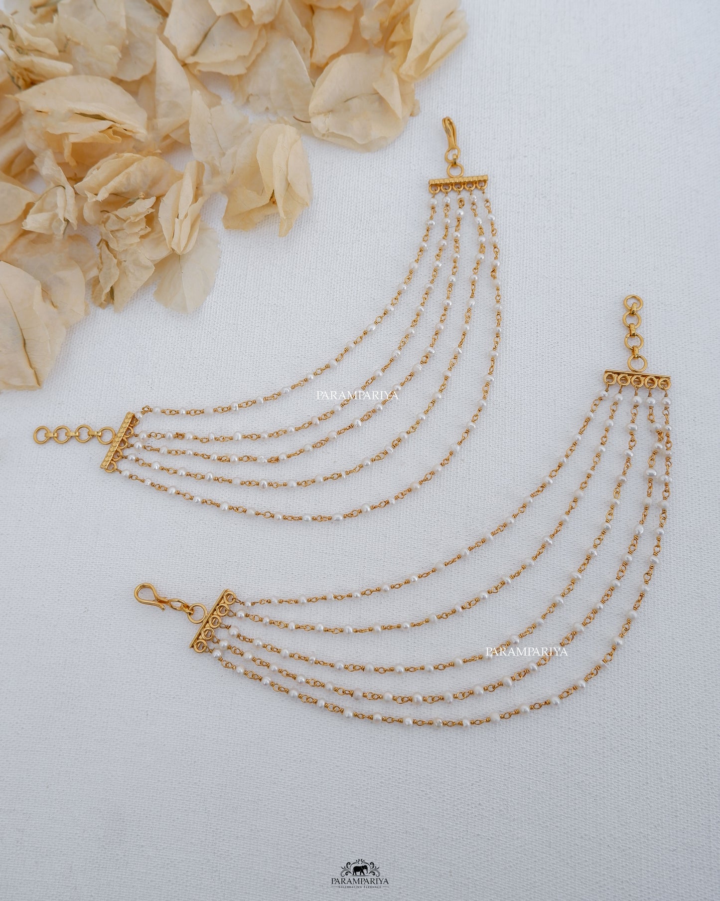 The Pearl Hues!!
Pure silver micron gold plated pearl layered earchain.