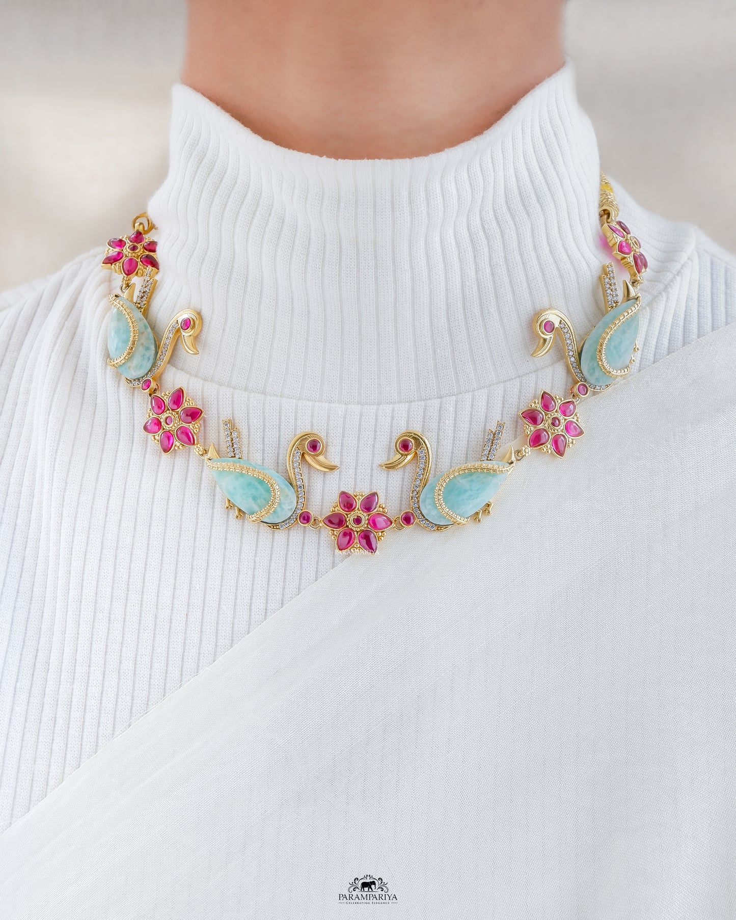 Gold plated kemp swan necklace with zircon and cut stones