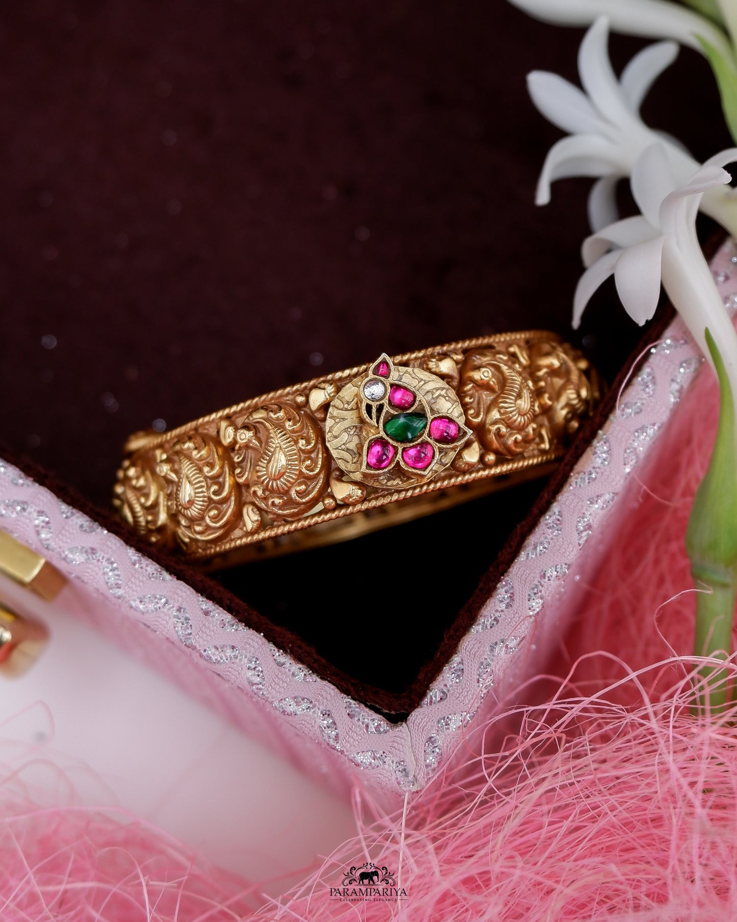 Temple bangle with kundan stones