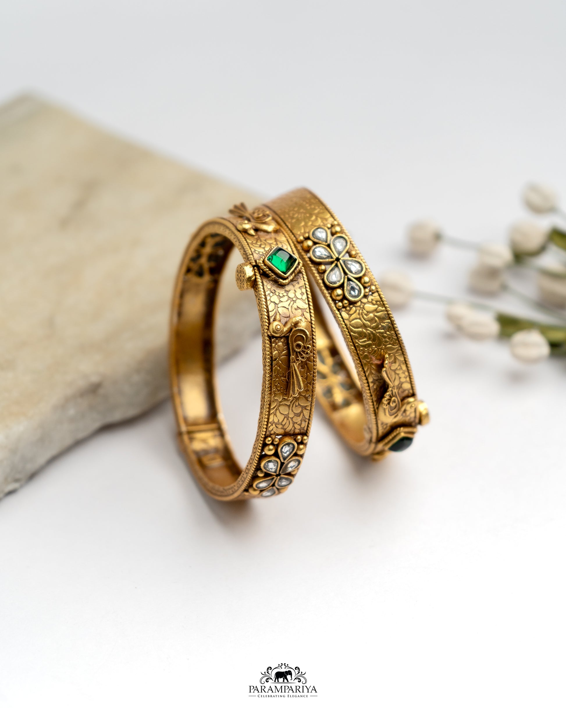 The Bangle Bliss!!

pure silver gold plated openable temple kada bangles with a touch of semi precious stones for your special occasions