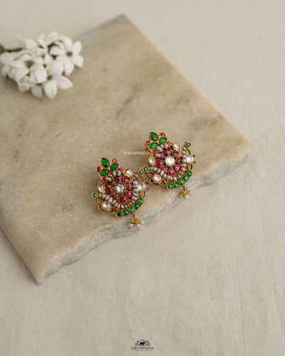Statement Kundan!!

pure silver gold plated kundan studs for a statement look.