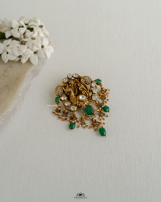 Peacock Elegance!!

Nakshi temple pendants crafted from 92.5 silver, gold micron plated and adroned with moissanite stones.