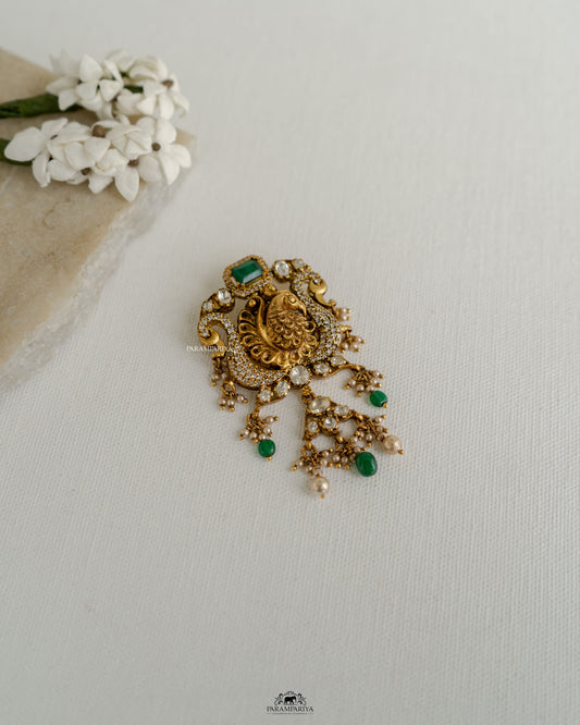 Peacock Elegance!!

Nakshi temple pendants crafted from 92.5 silver, gold micron plated and adroned with moissanite stones.
