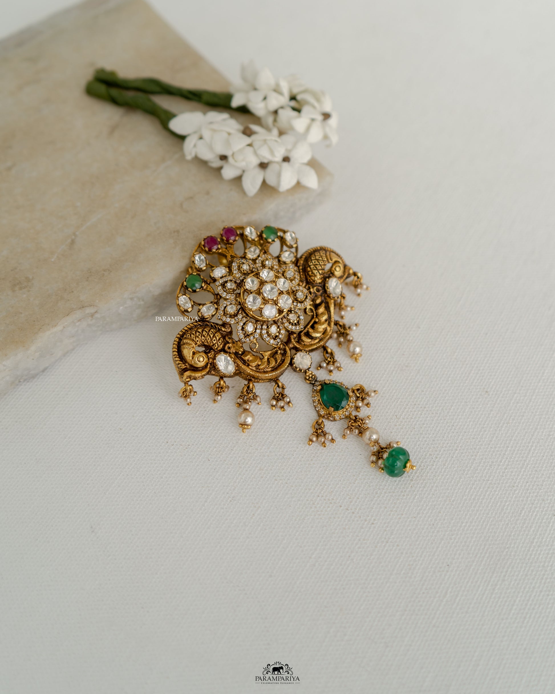 Peacock Elegance!!

Nakshi temple pendants crafted from 92.5 silver, gold micron plated and adroned with moissanite stones.