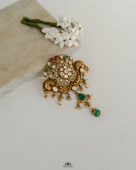 Peacock Elegance!!

Nakshi temple pendants crafted from 92.5 silver, gold micron plated and adroned with moissanite stones.