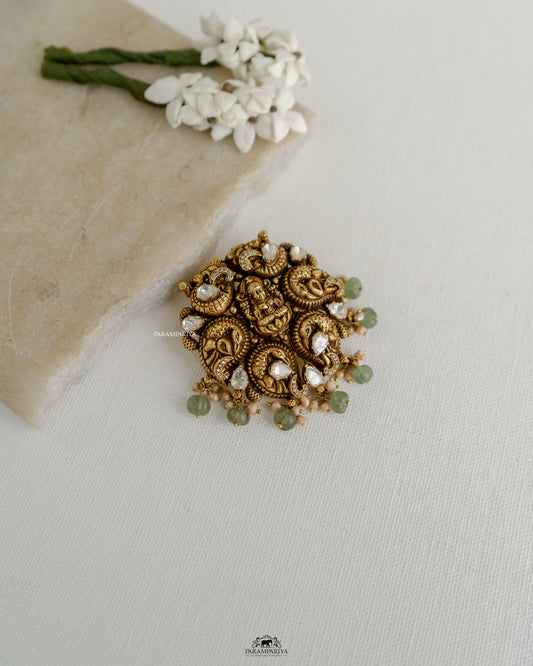 Peacock Elegance!!

Nakshi temple pendants crafted from 92.5 silver, gold micron plated and adroned with moissanite stones.