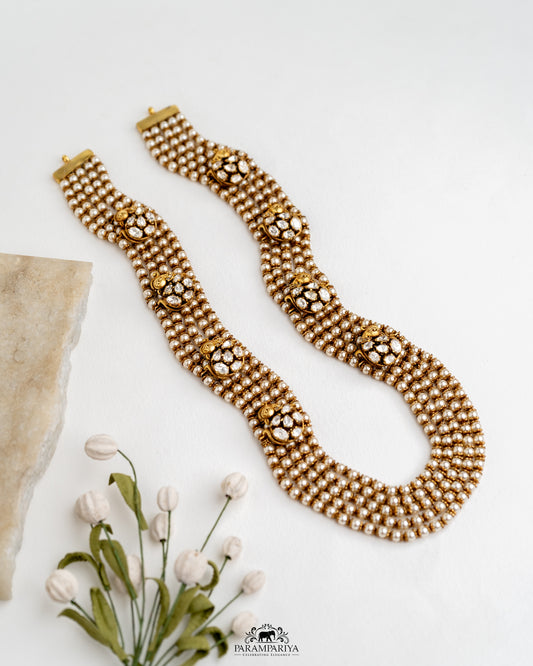 Pearl Classic!!

pure silver antique pearl mala with moissanite charms.