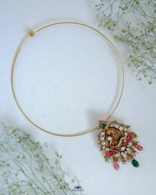 Simple hasli necklace with handcrafted temple nakshi pendant with moissanite, kundan stones for a minimal look.