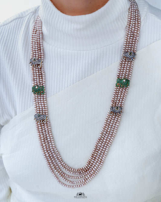 The Pearl Magic!! Parampariya’s very own elephant necklace in antique pearl with a touch of green zircon.