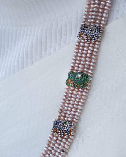 The Pearl Magic!! Parampariya’s very own elephant necklace in antique pearl with a touch of green zircon.