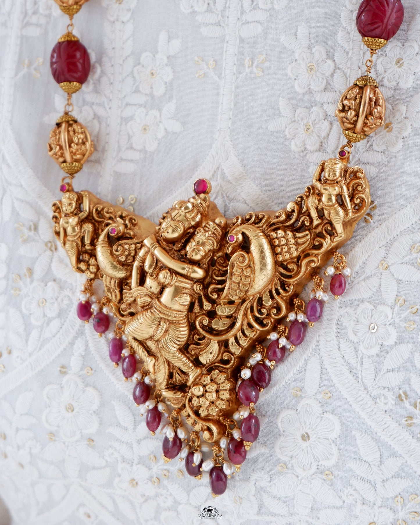 A captivating unisex necklace featuring Krishna Radha in pure silver and antique gold micron plating, this piece is part of our revered temple jewellery collection.