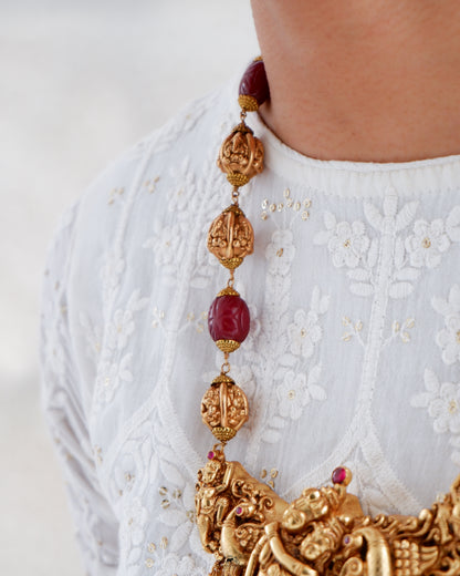 A captivating unisex necklace featuring Krishna Radha in pure silver and antique gold micron plating, this piece is part of our revered temple jewellery collection.