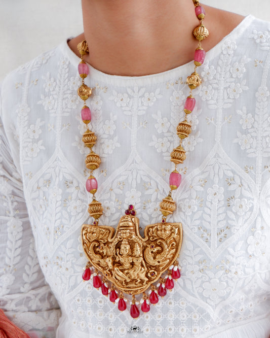 Intricately-crafted temple antique necklace featuring a depiction of Shiv and Paravathi on pure silver with antique gold micron plating, a perfect unisex necklace.