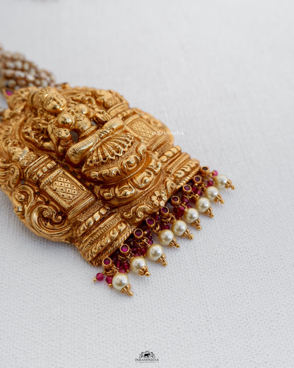 One of a kind temple necklace with gold micron plated pure silver Lakshmi pendant beaded with antique pearls for an ethnic statement look.