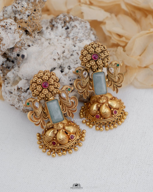 Elegant pure silver micron gold plated jhumkas for a statement look.