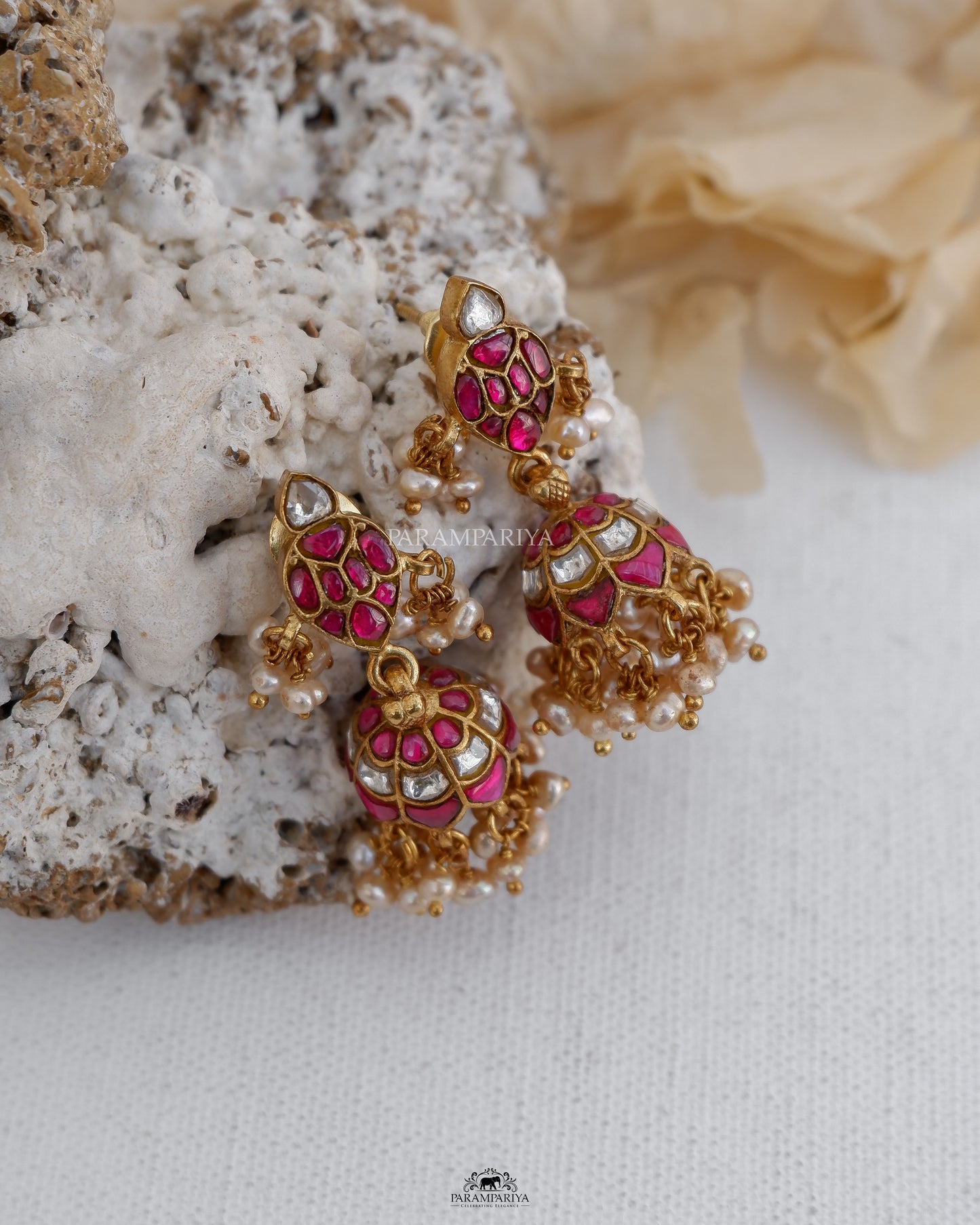 Pure silver micron gold plated kundan jhumkas for a minimal ethnic look.