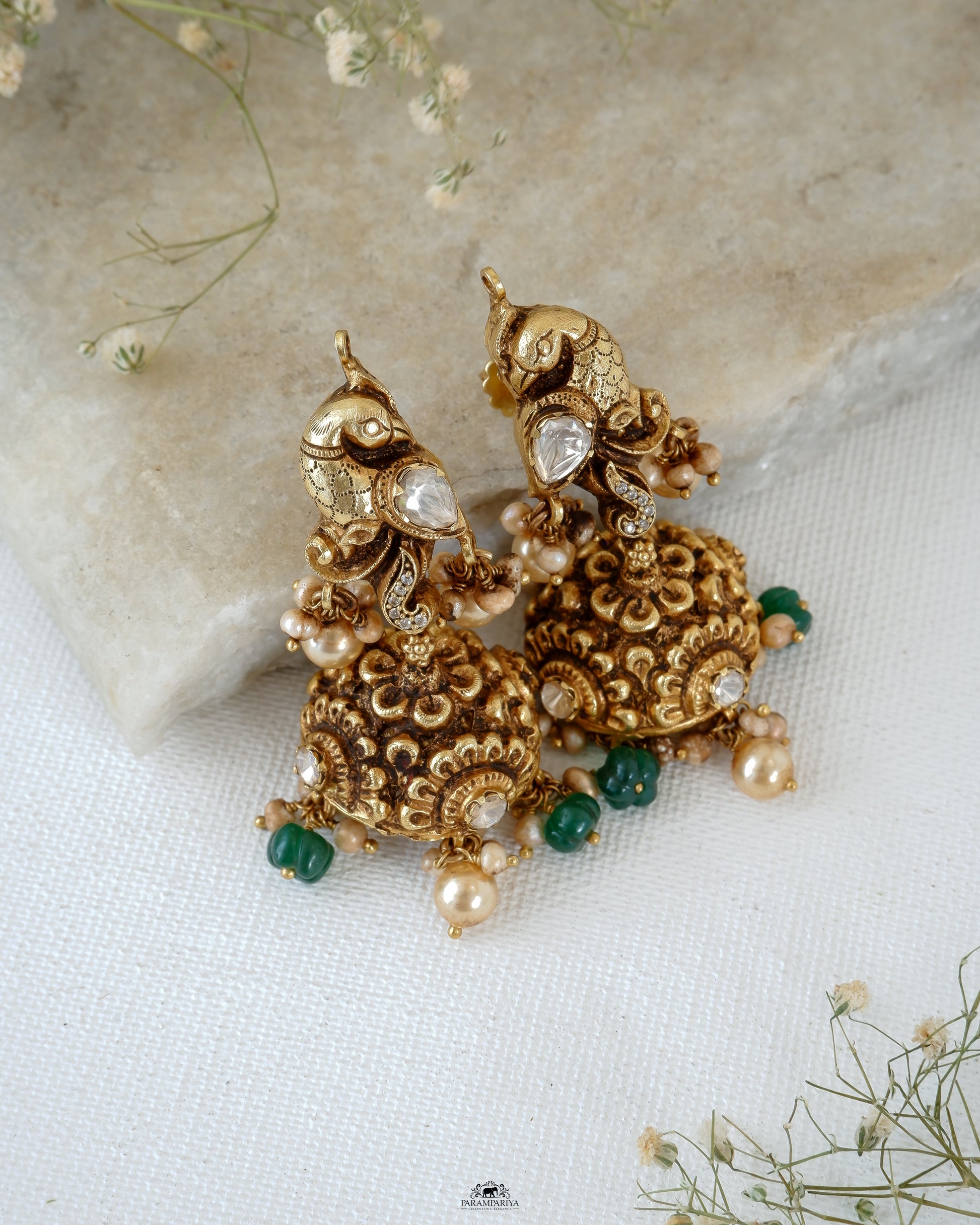 Mini jhumkas for an adorable look!!
Pure silver gold micron plated nakshi jhumkas with kundan and moissainite stones.