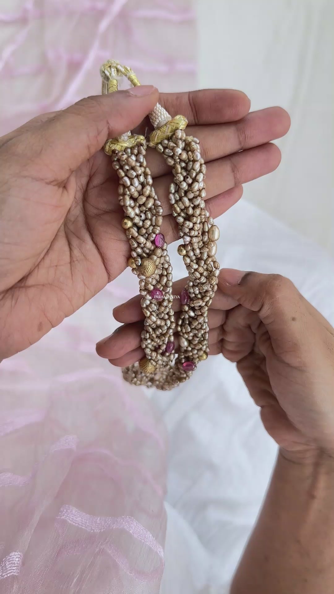 This one-of-a-kind necklace featuring a classically-styled bunch of antique fresh water pearls for a timelessly elegant look.